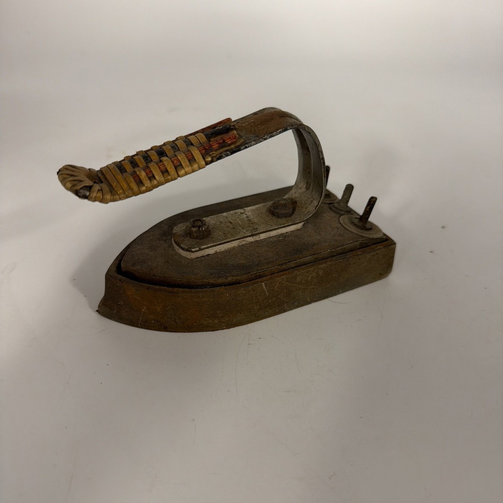 vintage portable electric travel iron, resembling older designs